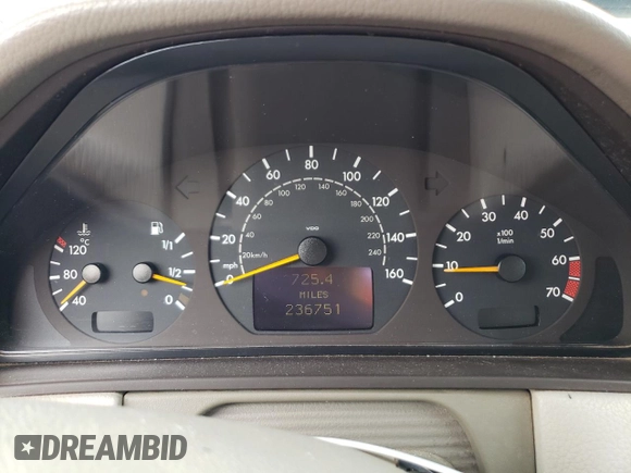 2000 Mercedes-Benz E-Class with VIN WDBJF65J5YB068297, listed as a Copart auction lot 69199004 with 236,751 mi miles and Salvage Title. Bid and sale history available at carsss.com. Image 9.