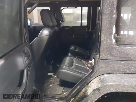 2015 Jeep Wrangler Unlimited Sahara with VIN 1C4BJWEG6FL688382, listed as a IAAI auction lot 41620621 with 138,119 mi miles. Bid and sale history available at carsss.com. Image 8.