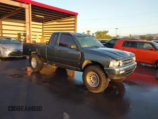 1991 Toyota 2WD Pickups DX with VIN JT4RN93P5M5033297, listed as a IAAI auction lot 41169925 with 202,064 mi miles. Bid and sale history available at carsss.com. Image 1.