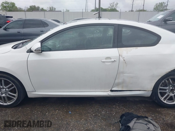 2007 Scion tC Spec with VIN JTKDE177070206157, listed as a IAAI auction lot 41890147 with 174,720 mi miles and . Bid and sale history available at DreamBid. Image 14.