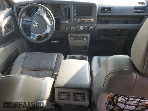 2012 Honda Ridgeline RTL z VIN 5FPYK1F51CB455815, wystawiony jako Copart lot #50969885 z przebiegiem Nie podano mil oraz Szkoda całkowita • Salvage title. Historia ofert i sprzedaży dostępna na DreamBid. Obrazek 8.