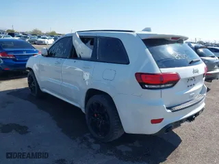 2015 Jeep Grand Cherokee SRT with VIN 1C4RJFDJ4FC122071, listed as a IAAI auction lot 41455849 with 251,476 mi miles. Bid and sale history available at carsss.com. Image 3.