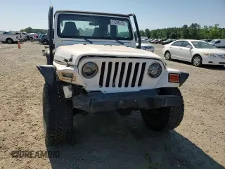 2003 Jeep Wrangler X with VIN 1J4FA39S13P311214, listed as a Copart auction lot 57345175 with 75,088 mi miles and Salvage title. Bid and sale history available at DreamBid. Image 14.