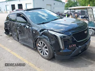 2019 Cadillac XT4 AWD Sport with VIN 1GYFZFR44KF140894, listed as a IAAI auction lot 42496698 with 79,768 mi miles and . Bid and sale history available at DreamBid. Image 1.