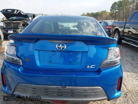 2014 Scion tC with VIN JTKJF5C72E3086001, listed as a IAAI auction lot 41721986 with 207,239 mi miles. Bid and sale history available at carsss.com. Image 16.