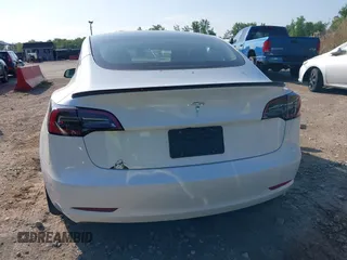 2023 Tesla Model 3 with VIN 5YJ3E1EA3PF617460, listed as a IAAI auction lot 42154401 with 9,578 mi miles and . Bid and sale history available at DreamBid. Image 15.