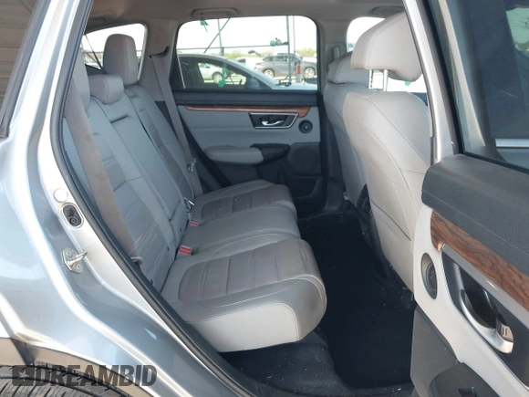 2020 Honda CR-V EX-L z VIN 2HKRW2H8XLH687314, wystawiony jako IAAI lot #41955562 z przebiegiem 54 336 mil mil oraz . Historia ofert i sprzedaży dostępna na DreamBid. Obrazek 8.