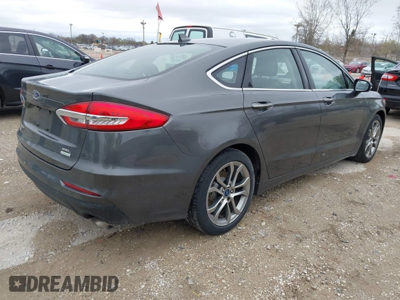 2019 Ford Fusion SEL with VIN 3FA6P0CDXKR129411, listed as a IAAI auction lot 42082323 with 126,048 mi miles and . Bid and sale history available at DreamBid. Image 4.