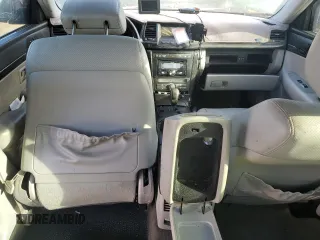 2009 Kia Amanti z VIN KNALD225095171348, wystawiony jako Copart lot #76008324 z przebiegiem Nie podano mil oraz Szkody całkowita. Historia ofert i sprzedaży dostępna na DreamBid. Obrazek 8.