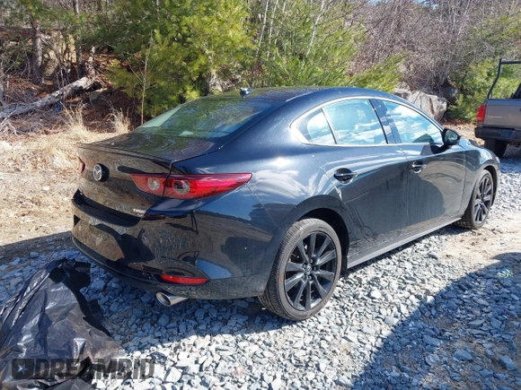 2023 Mazda 3 Premium Plus with VIN 3MZBPBEY9PM385318, listed as a IAAI auction lot 41882334 with 10,582 mi miles and . Bid and sale history available at DreamBid. Image 4.