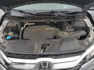 2018 Honda Odyssey EX-L z VIN 5FNRL6H74JB033475, wystawiony jako Copart lot #55736415 z przebiegiem 104 108 mil mil oraz Szkoda całkowita • Salvage title. Historia ofert i sprzedaży dostępna na DreamBid. Obrazek 12.