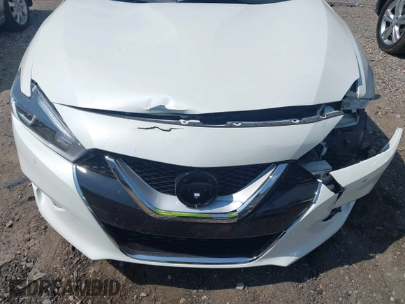 2017 Nissan Maxima S with VIN 1N4AA6APXHC371182, listed as a IAAI auction lot 42596000 with 159,710 mi miles and . Bid and sale history available at DreamBid. Image 17.