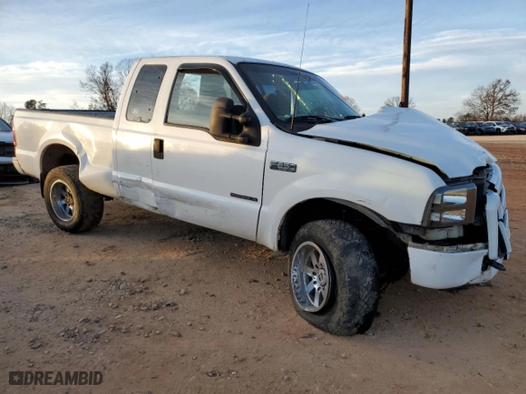 2000 Ford Super Duty F-250 XL with VIN 1FTNX20F2YED69507, listed as a Copart auction lot 84607524 with 409,689 mi miles and Salvage Title. Bid and sale history available at carsss.com. Image 4.