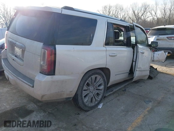 2017 GMC Yukon Denali with VIN 1GKS2CKJ4HR310822, listed as a IAAI auction lot 41666174 with 101,388 mi miles. Bid and sale history available at carsss.com. Image 4.