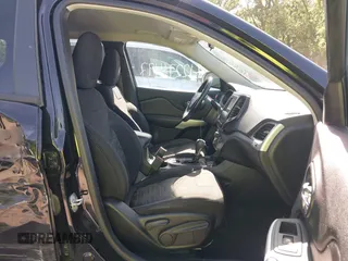 2019 Jeep Cherokee Latitude z VIN 1C4PJMCX2KD473275, wystawiony jako IAAI lot #42276497 z przebiegiem 123 117 mil mil oraz . Historia ofert i sprzedaży dostępna na DreamBid. Obrazek 5.