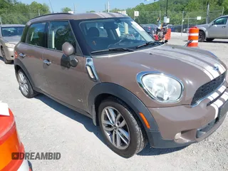 2011 MINI Countryman S with VIN WMWZC5C53BWL53767, listed as a IAAI auction lot 42427187 with 84,727 mi miles and . Bid and sale history available at DreamBid. Image 1.