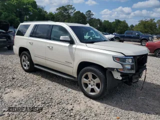 2015 Chevrolet Tahoe LT z VIN 1GNSCBKC5FR638002, wystawiony jako Copart lot #54857225 z przebiegiem 142 165 mil mil oraz Szkoda całkowita • Salvage title. Historia ofert i sprzedaży dostępna na DreamBid. Obrazek 4.