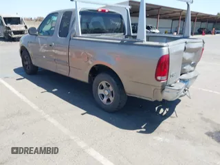 2002 Ford F-150 XL with VIN 1FTRX17272KE07014, listed as a IAAI auction lot 42381725 with 212,294 mi miles and . Bid and sale history available at DreamBid. Image 3.