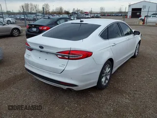 2017 Ford Fusion SE with VIN 3FA6P0HD9HR140417, listed as a IAAI auction lot 41942047 with 113,915 mi miles. Bid and sale history available at carsss.com. Image 4.