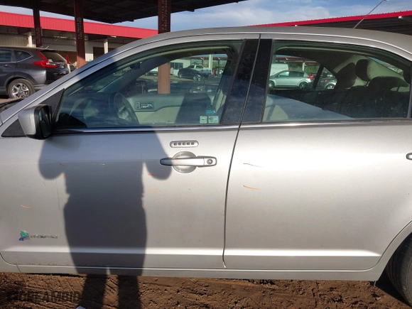 2011 Ford Fusion Hybrid with VIN 3FADP0L35BR256789, listed as a IAAI auction lot 40737584 with 133,683 mi miles. Bid and sale history available at carsss.com. Image 15.