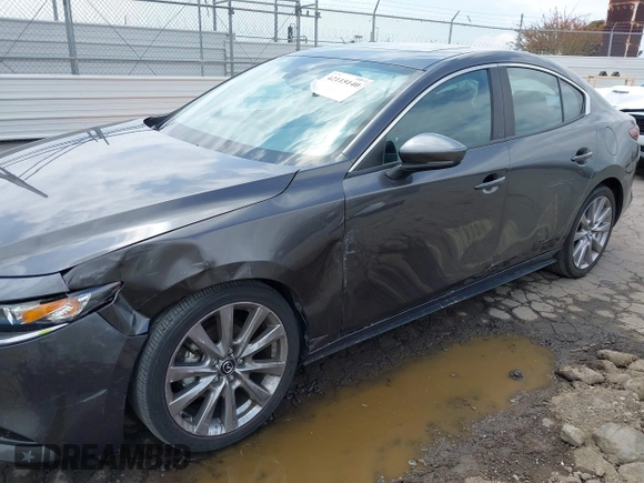 2021 Mazda 3 Preferred with VIN 3MZBPACL4MM214814, listed as a IAAI auction lot 42115140 with 28,860 mi miles and . Bid and sale history available at DreamBid. Image 6.