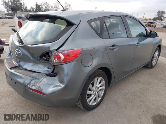 2012 Mazda Mazda3 i Touring with VIN JM1BL1L84C1671872, listed as a IAAI auction lot 42116842 with 85,343 mi miles. Bid and sale history available at carsss.com. Image 4.