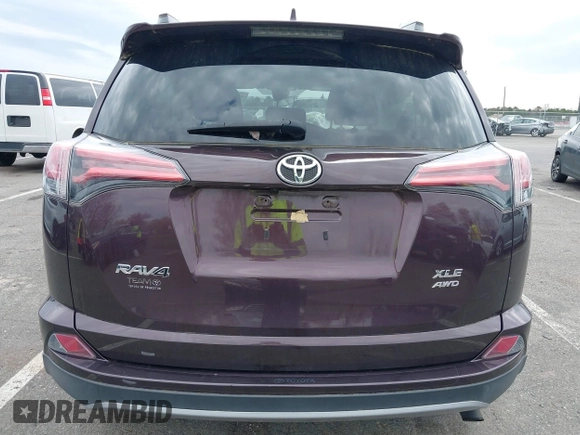 2018 Toyota RAV4 XLE with VIN 2T3RFREV5JW811742, listed as a IAAI auction lot 42030276 with 58,034 mi miles. Bid and sale history available at carsss.com. Image 16.
