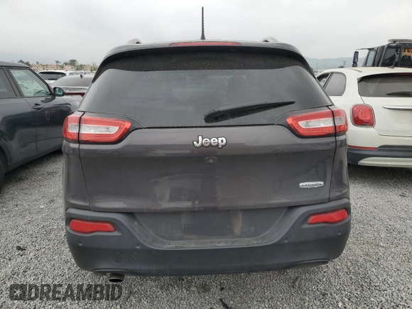 2015 Jeep Cherokee Latitude with VIN 1C4PJLCB6FW766637, listed as a Copart auction lot 53584485 with 128,168 mi miles and Salvage Title. Bid and sale history available at carsss.com. Image 6.