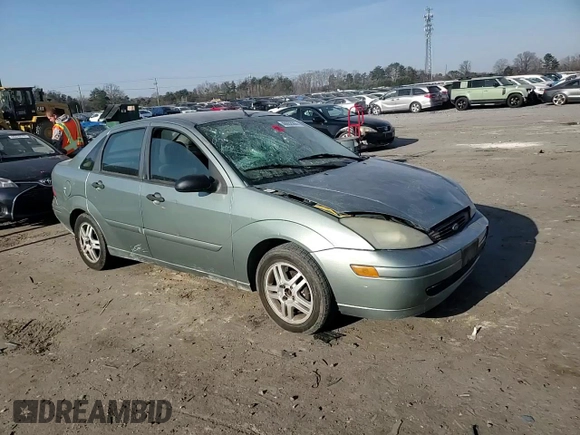 2004 Ford Focus SE with VIN 1FAFP34314W127053, listed as a Copart auction lot 48652265 with 241,841 mi miles and Salvage title. Bid and sale history available at DreamBid. Image 10.