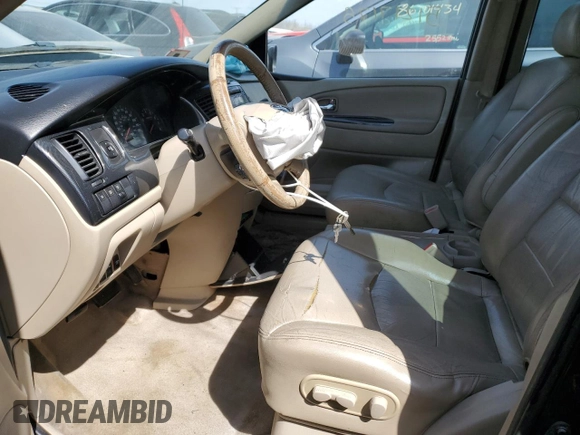 2003 Mazda MPV LX with VIN JM3LW28J330354269, listed as a Copart auction lot 51217175 with 205,589 mi miles and Salvage Title. Bid and sale history available at carsss.com. Image 7.