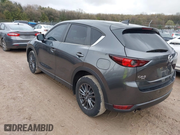 2020 Mazda CX-5 Touring with VIN JM3KFBCM2L0850855, listed as a IAAI auction lot 42147339 with 75,955 mi miles and . Bid and sale history available at carsss.com. Image 3.