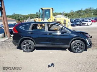 2014 Honda CR-V LX with VIN 2HKRM4H31EH677117, listed as a IAAI auction lot 40505186 with 186,122 mi miles. Bid and sale history available at carsss.com. Image 14.
