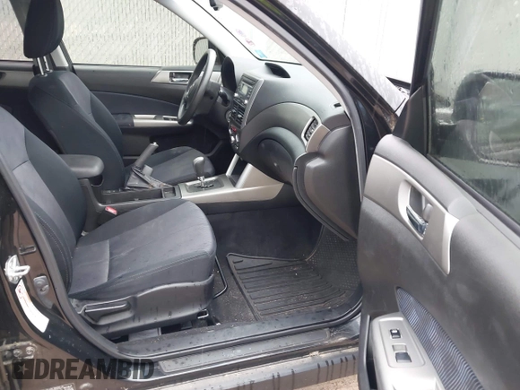 2009 Subaru Forester X z VIN JF2SH63689H787607, wystawiony jako IAAI lot #42694159 z przebiegiem 178 663 mil mil oraz . Historia ofert i sprzedaży dostępna na DreamBid. Obrazek 5.