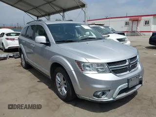 2013 Dodge Journey SXT with VIN 3C4PDCBG9DT506384, listed as a IAAI auction lot 42119685 with 143,769 mi miles. Bid and sale history available at carsss.com. Image 1.