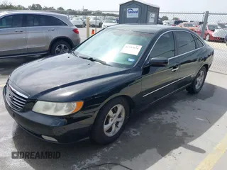2006 Hyundai Azera SE with VIN KMHFC46F06A113482, listed as a IAAI auction lot 41733834 with 242,159 mi miles and . Bid and sale history available at DreamBid. Image 2.