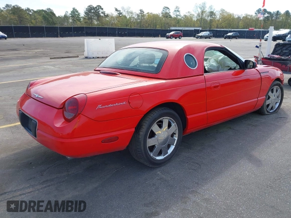 2002 Ford Thunderbird Hardtop Premium with VIN 1FAHP60A02Y130882, listed as a IAAI auction lot 41911737 with 18,521 mi miles and . Bid and sale history available at DreamBid. Image 4.