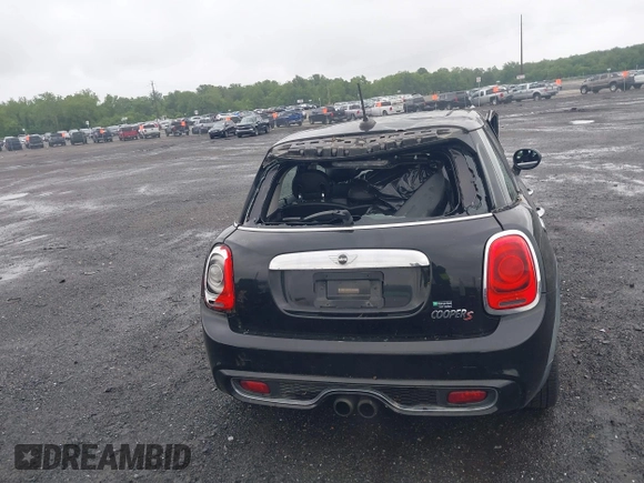 2015 MINI Hardtop 4 Door S with VIN WMWXU3C55F2B56429, listed as a IAAI auction lot 42335996 with 114,781 mi miles and . Bid and sale history available at DreamBid. Image 17.