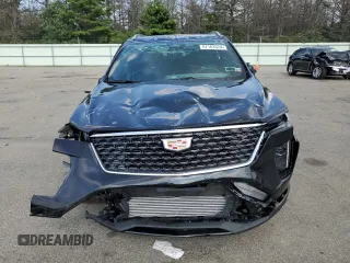 2024 Cadillac XT4 AWD Premium Luxury with VIN 1GYFZDR49RF112460, listed as a Copart auction lot 67183524 with 12,396 mi miles and Salvage title. Bid and sale history available at DreamBid. Image 5.