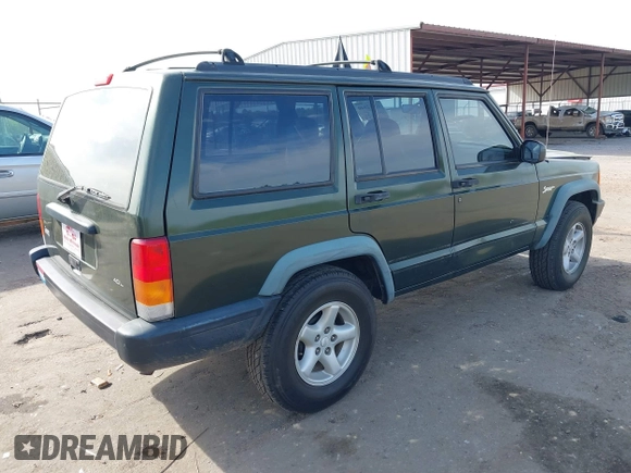 1998 Jeep Cherokee Sport with VIN 1J4FT68S8WL131348, listed as a IAAI auction lot 41912540 with 111,579 mi miles. Bid and sale history available at carsss.com. Image 4.