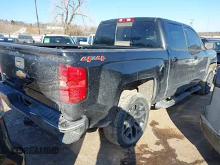 2015 Chevrolet Silverado 1500 LT with VIN 3GCUKREC8FG309500, listed as a IAAI auction lot 41568103 with 174,211 mi miles and . Bid and sale history available at DreamBid. Image 4.