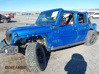 2024 Jeep Wrangler Sport S z VIN 1C4RJXN69RW257484, wystawiony jako IAAI lot #41347564 z przebiegiem 7 359 mil mil oraz . Historia ofert i sprzedaży dostępna na DreamBid. Obrazek 2.