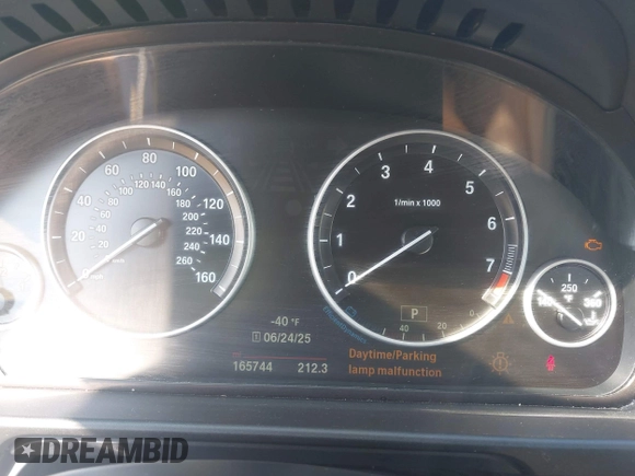 2015 BMW 5 Series 528i with VIN WBA5A5C52FD518794, listed as a IAAI auction lot 42571091 with 165,744 mi miles and . Bid and sale history available at DreamBid. Image 7.