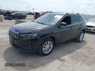 2019 Jeep Cherokee Latitude with VIN 1C4PJLCBXKD284954, listed as a IAAI auction lot 41877944 with 134,931 mi miles. Bid and sale history available at carsss.com. Image 14.