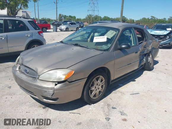 2006 Ford Taurus SE with VIN 1FAFP53U96A223924, listed as a IAAI auction lot 41828443 with 114,653 mi miles. Bid and sale history available at carsss.com. Image 6.