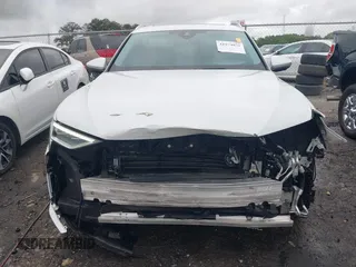 2023 Audi e-tron Premium Plus z VIN WA1LAAGE8PB006137, wystawiony jako IAAI lot #41974875 z przebiegiem 21 728 mil mil oraz . Historia ofert i sprzedaży dostępna na DreamBid. Obrazek 6.