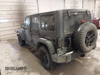 2016 Jeep Wrangler Unlimited Sport with VIN 1C4BJWDG9GL114359, listed as a IAAI auction lot 41422535 with 133,462 mi miles and . Bid and sale history available at DreamBid. Image 3.