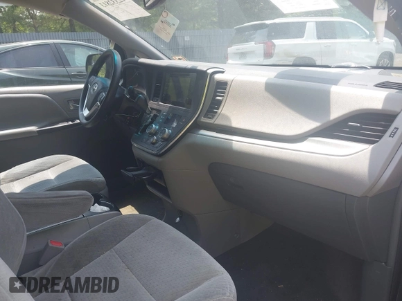 2015 Toyota Sienna LE AAS with VIN 5TDKK3DC8FS587644, listed as a IAAI auction lot 42332813 with 125,675 mi miles and . Bid and sale history available at DreamBid. Image 5.