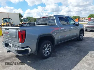 2024 GMC Sierra 1500 SLT with VIN 3GTPHDED1RG163954, listed as a IAAI auction lot 41548691 with 52,065 mi miles and . Bid and sale history available at DreamBid. Image 4.