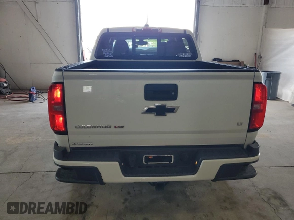 2019 Chevrolet Colorado 4WD LT z VIN 1GCGTCEN9K1284012, wystawiony jako Copart lot #55309155 z przebiegiem 63 998 mil mil oraz Szkoda całkowita • Salvage title. Historia ofert i sprzedaży dostępna na DreamBid. Obrazek 6.