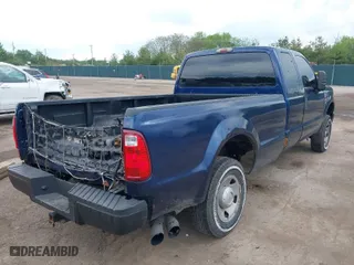 2009 Ford Super Duty F-250 SRW XL with VIN 1FTSX21R89EA60895, listed as a IAAI auction lot 39419254 with 154,411 mi miles. Bid and sale history available at carsss.com. Image 4.